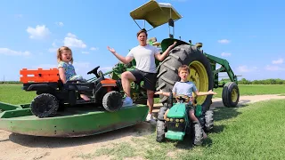 Working on tractors and playing in the water | Tractors for kids on the farm