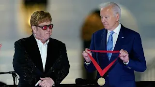 President Biden Surprises Elton John with National Humanities Medal at White House Concert