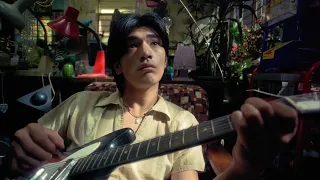 Takeshi Kaneshiro plays guitar in First Love: The Litter on the Breeze (1997)