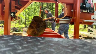 Earl running sawmill cutting 5x10 beams