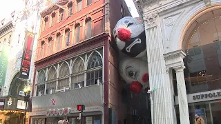 What's the story behind these clowns in a Boston alley?