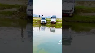 Toyota land cruiser rkr through the water in pakistan