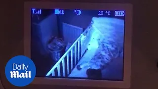 Dad spots something on baby monitor that leaves him pale as a ghost