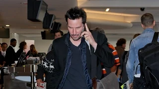 Keanu Reeves Takes A Call And Avoids The Paps At LAX