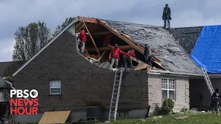 News Wrap: Storm system brings tornadoes to South and Midwest, snow to New England