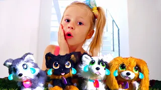 Nastya finge brincar com cachorros de brinquedo