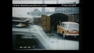 Rail car transporter at King's Cross Railway Station, 1960.  Archive film 63285