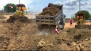 Action Abul D30 with a 6-wheeler pouring soil.[Bulldozers truck sso]