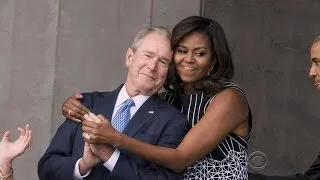 Bonding moment between former president Bush and Michelle Obama