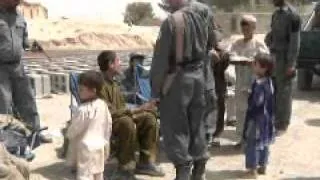 Coalition Troops Donate Shoes to Afghan Children