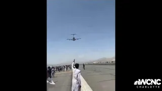 Dramatic video at Kabul airport as Afghans try to flee, rush plane on runway