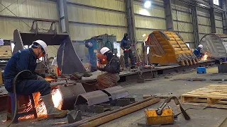 Process of Making a Steel Volvo Excavator Bucket. Heavy Equipment Factory in Korea.