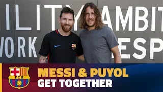 Lionel Messi and Carles Puyol, a reunion of legends