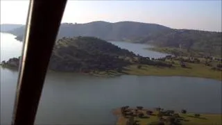 TRIKE FLYING ABOVE WATERS