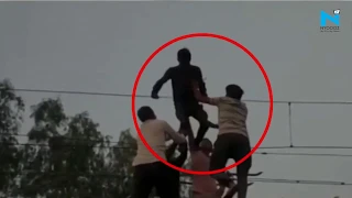 Man dangles from railways high tension wire in Gwalior, GRP rescues