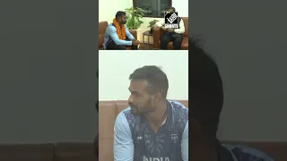 Delhi: Union Minister Dharmendra Pradhan meets Javelin thrower Kishore Jena