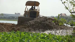 Amazing Machinery working land filling Bulldozer pushing dirt and 10 wheel truck unloading dirt