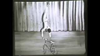Lilly Yokoi - balancing act on a bike (1961)