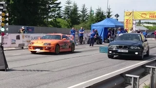 BMW 540i E39 4.4K vs 2JZ Toyota Supra Mk4 1/8mile drag race