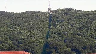 Timpul cu care urcă/coboară o telecabină pe muntele Tâmpa din Brașov