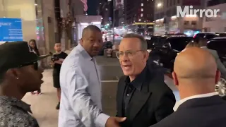 Tom Hanks shouts angrily at wrong fan for tripping his wife.