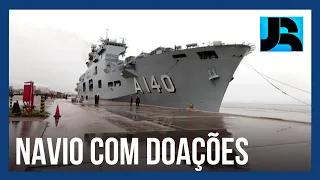 Maior navio de guerra da Marinha chega ao Rio Grande do Sul com mais de 150 toneladas de doações