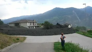 Mudslide pummels through Swiss village