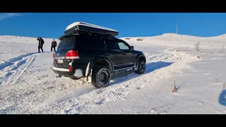 Toyota Land Cruiser and Suzuki Grand Vitara offroad in snow Reykjavík Iceland.