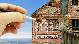 Painting A Miniature French House Made From Styrofoam