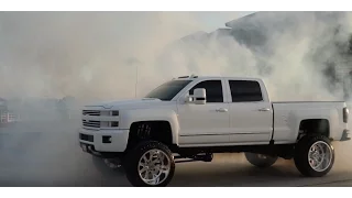 Lifted Chevy High Country does a badass burnout!