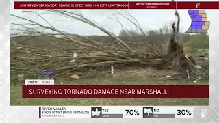 Surveying suspected tornado damage near Marshall