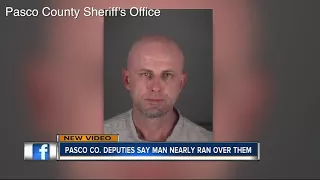 Pasco Co. Deputies say man nearly ran over them