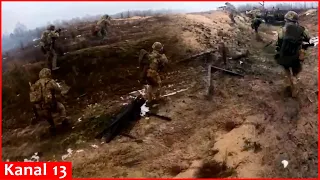 Ukrainian fighters disembarking an armored vehicle, clear a stronghold from Russians -Combat footage