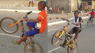 YOUNG BICYCLE RIDERS DISPLAYING THEIR SKILLS INSIDE ACCRA