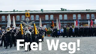 When the Germans carry the troop flag with marching music from the parade ground (Frei Weg March)