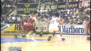 Olsen Racela squeezes for the layup over Franz Pumaren (1994 PBA All-Filipino Cup Finals)