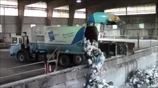 Garbage Trucks Dumping at the Transfer Station
