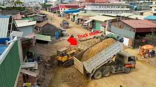 Updating Processing Filling Build Foundation Village By Bulldozer Push Rock and sand, Long Truck