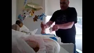 Daughter laughs while dad changing poopy nappy (hilarious)