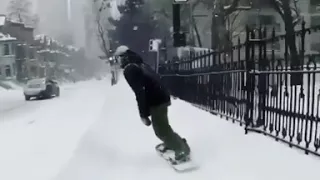 Seb Toots snowboarding through Montreal