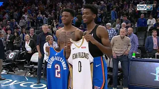 Cousins Exchanging Jerseys after Thunder Win over the Pelicans