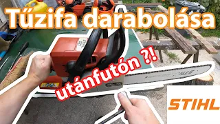 Kivágott cseresznyefa darabolása az utánfuón stihl 021 láncfűrésszel. - POV cutting logs with stihl