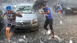 A terrible hail storm hits the city of Ile-de-France in France, piles of hailstones are falling