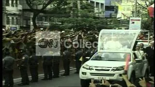 POPE FRANCIS IN POPEMOBILE WAVES TO ONLOOKERS