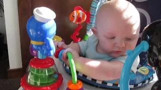 Odin Playing With His Baby Einstein Neptune Activity Saucer