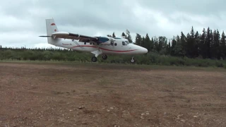 Twin Otter plane short runway takeoff Birch Mountain Airfield, Alberta
