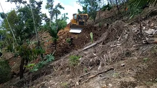 Excellent!! How a CAT D6R XL Bulldozer operator opens a garden road on a hill