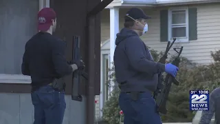 ATF, FBI agents remove several guns from home on Robert Drive in Holyoke