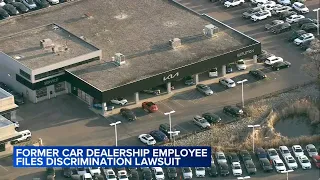 Former employee sues suburban car dealership, alleging unequal pay and use of racial slurs