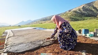 The cementing of the roof of the porch of the house by the Ashairi Majid family